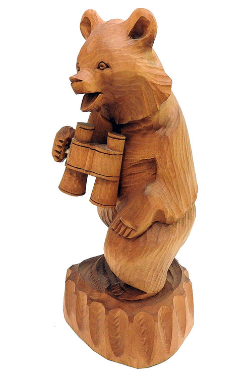 Misha Bear, Commander of the Forest (Миша Медведь, Хозяин Леса). Misha, the endearing moniker for a Russian bear, stalks about his domain with his trusty binoculars, while bird watching at the same time. Striking carving from Bogorodsk, circa 1990. 11" in height.