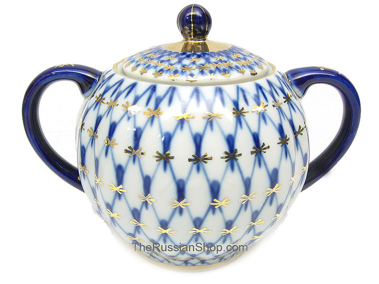 Cobalt Net Sugar Bowl.  This fine porcelain sugar bowl with lid from the Lomonosov Porcelain factory is decorated in the classic Cobalt Net pattern and is the genuine article! pairs up nicely with the full-size creamer. Fully hand painted and decorated in St. Petersburg, Russia. Not a Chinese knock-off! Red ЛВЗ (LFZ) backstamp and "Made in Russia" in English. Mineral cobalt, 22Kt gold.  4½" in height.