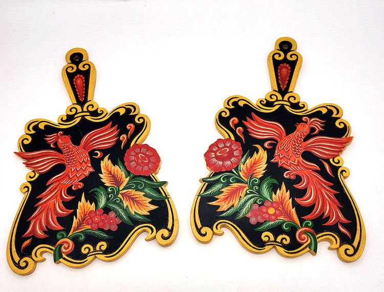 Firebird Cutting Board (Доска разделочная). A pair of mirror-image hand painted and carved cutting boards depicting the Firebird in flight. About it are fruits and flowers. 13" x 7¾" at the widest point. Unknown factory or date, probably 2000s, and probably Semenov factory. These are suitable for a Russian farmhouse (dacha) decor.
