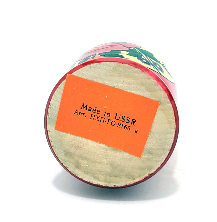 Classic Mashenka (Машенька) Semenov Matryoshka Doll. Mashenka is the diminutive form of Mary and the classic Semenov maiden is known sometimes by this name. Ours has the rectangular orange paper "Made in the USSR" label and was made in the late 1980s. So, what makes this doll a classics? For starters, the faces and fingers on every doll are carefully painted. Attention is given to the colors and the flowers, which are also meticulously painted. Each doll is a smaller version of the previous one and several sport the so-called "fingerprint" swirls. These dolls are not at all what is currently produced in Russia or elsewhere. Vintage dolls reflect a bygone era when artists painted for the sake of the art and for each other. They're just not making them like this one anymore.