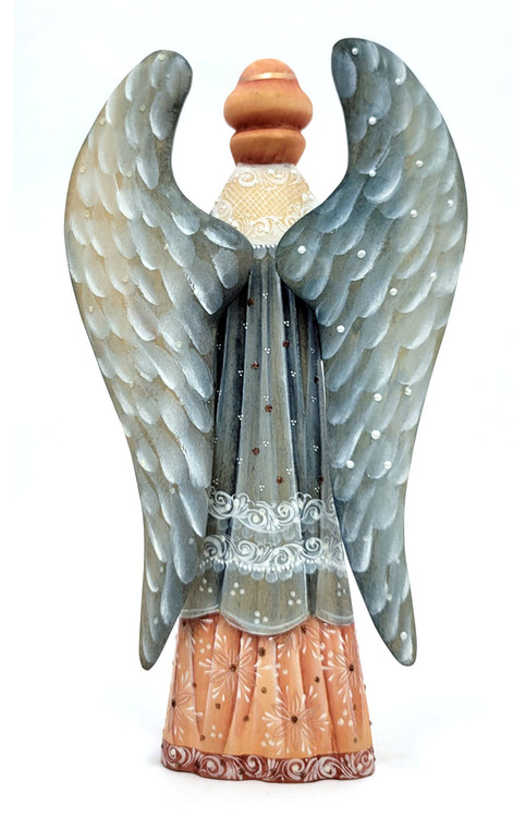 Angel with Candle (Ангел со свечой). A finely carved and fully painted angel holds a lighted candle. Angels are symbols of innocence, purity, devotion, hope, faith, and love. The candle she holds is a symbol of the light of life. Candles are lit in church as a prayer for peace or as a request for healing.