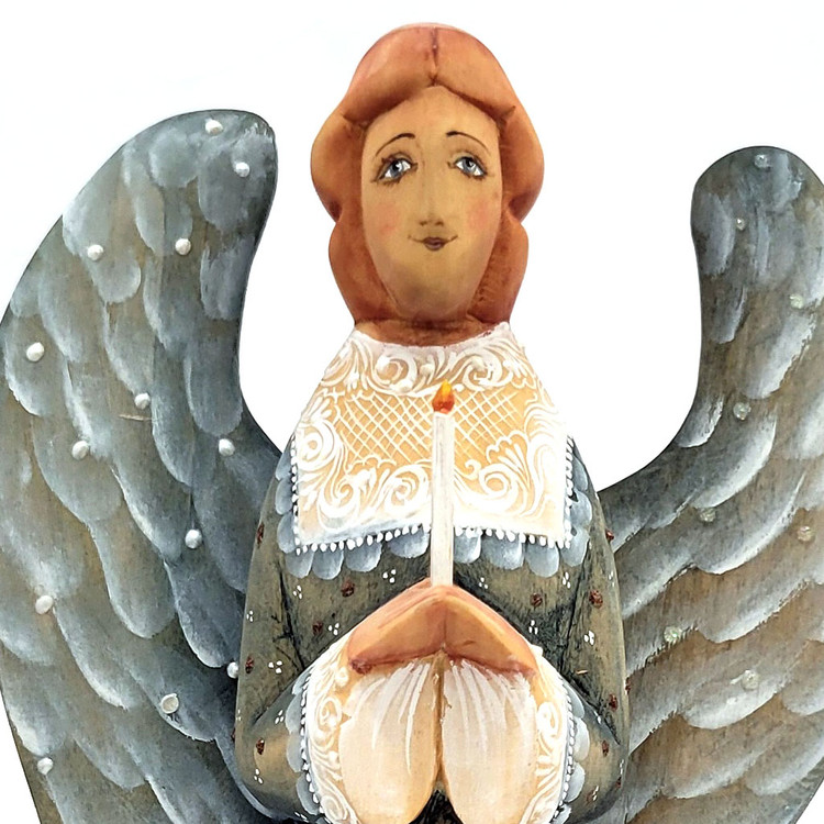 Tall Angel with Candle Carving (Ангел со свечой). A finely carved and fully painted angel holds a lighted candle. Angels are symbols of innocence, purity, devotion, hope, faith, and love. The candle she holds is a symbol of the light of life. Candles are lit in church as a prayer for peace or as a request for healing.  Made in Sergiev Posad, Russia about 10 years ago. 9" in height.