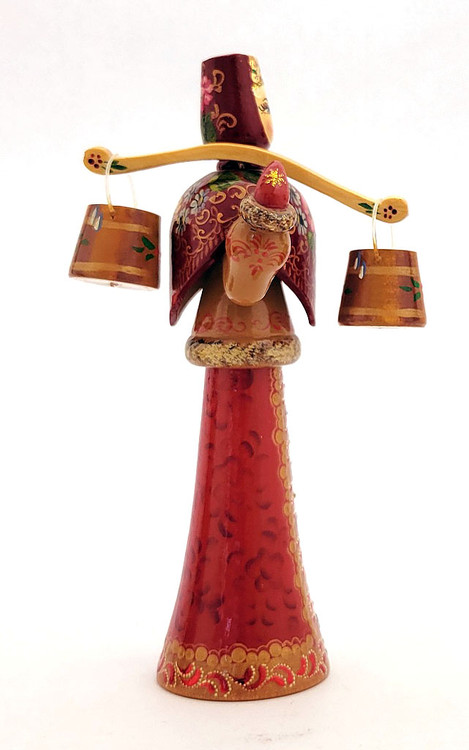 Maiden from Tver Carrying Buckets of Water. An elegantly dressed young girl carries two buckets of water using a bowed yoke. The piece is hand made from wood, fully painted and lacquered. The yoke is removeable and the buckets are as well. The artist's initials and a dedication to a young girl is written in Russian inside the bottom of the piece. Lots of fine detail in this uncommon example of Tver folk art. Maiden from Tver Carrying Buckets of Water. An elegantly dressed young girl carries two buckets of water using a bowed yoke. The piece is hand made from wood, fully painted and lacquered. The yoke is removeable and the buckets are as well. The artist's initials and a dedication to a young girl is written in Russian inside the bottom of the piece. Lots of fine detail in this uncommon example of Tver folk art.