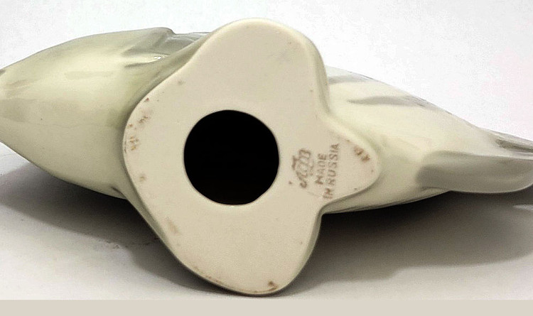 The lovely, striped discus, aka pompadour, fish as created in the Lomonosov Porcelain Factory in St. Petersburg. 8½" x 3" x 7¼". Hand painted, Lomonosov backstamp. Brand new condition.The symphysodon is a genus of cichlids native to the Amazon river basin in Brazil. Due to their distinctive shape, calm behavior, and dedicated parenting techniques, discus are popular as freshwater aquarium fish. It has attracted a large hobbyist following and has created a multimillion dollar international industry complete with shows, competitions, and reputable online breeders. The lovely, striped discus, aka pompadour, fish as created in the Lomonosov Porcelain Factory in St. Petersburg. 8½" x 3" x 7¼". Hand painted, Lomonosov backstamp. Brand new condition.The symphysodon is a genus of cichlids native to the Amazon river basin in Brazil. Due to their distinctive shape, calm behavior, and dedicated parenting techniques, discus are popular as freshwater aquarium fish. It has attracted a large hobbyist following and has created a multimillion dollar international industry complete with shows, competitions, and reputable online breeders.
