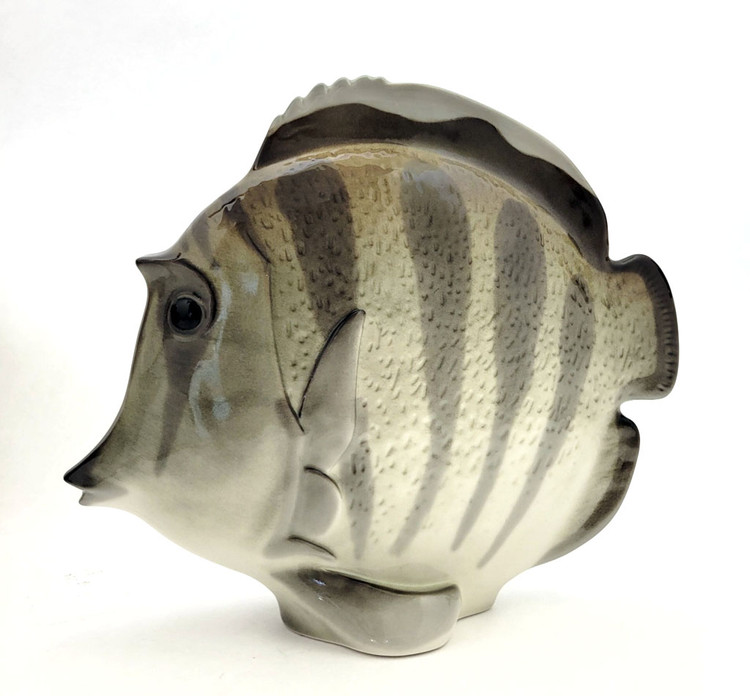 The lovely, striped discus, aka pompadour, fish as created in the Lomonosov Porcelain Factory in St. Petersburg. 8½" x 3" x 7¼". Hand painted, Lomonosov backstamp. Brand new condition.The symphysodon is a genus of cichlids native to the Amazon river basin in Brazil. Due to their distinctive shape, calm behavior, and dedicated parenting techniques, discus are popular as freshwater aquarium fish. It has attracted a large hobbyist following and has created a multimillion dollar international industry complete with shows, competitions, and reputable online breeders. The lovely, striped discus, aka pompadour, fish as created in the Lomonosov Porcelain Factory in St. Petersburg. 8½" x 3" x 7¼". Hand painted, Lomonosov backstamp. Brand new condition.The symphysodon is a genus of cichlids native to the Amazon river basin in Brazil. Due to their distinctive shape, calm behavior, and dedicated parenting techniques, discus are popular as freshwater aquarium fish. It has attracted a large hobbyist following and has created a multimillion dollar international industry complete with shows, competitions, and reputable online breeders.