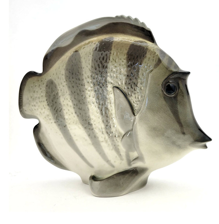 The lovely, striped discus, aka pompadour, fish as created in the Lomonosov Porcelain Factory in St. Petersburg. 8½" x 3" x 7¼". Hand painted, Lomonosov backstamp. Brand new condition.The symphysodon is a genus of cichlids native to the Amazon river basin in Brazil. Due to their distinctive shape, calm behavior, and dedicated parenting techniques, discus are popular as freshwater aquarium fish. It has attracted a large hobbyist following and has created a multimillion dollar international industry complete with shows, competitions, and reputable online breeders. The lovely, striped discus, aka pompadour, fish as created in the Lomonosov Porcelain Factory in St. Petersburg. 8½" x 3" x 7¼". Hand painted, Lomonosov backstamp. Brand new condition.The symphysodon is a genus of cichlids native to the Amazon river basin in Brazil. Due to their distinctive shape, calm behavior, and dedicated parenting techniques, discus are popular as freshwater aquarium fish. It has attracted a large hobbyist following and has created a multimillion dollar international industry complete with shows, competitions, and reputable online breeders.