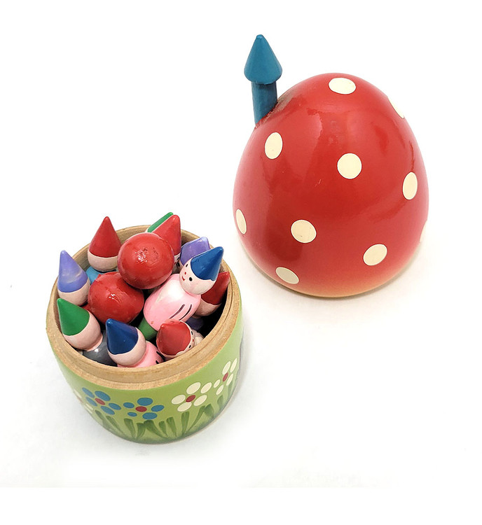 Mushroom House and Ten Gnomes Bowling Toy Set. Vintage Polish nesting toy from the 1980s. Ten colorful wood gnomes and two red wooden balls are housed in a mushroom house. All wood, hand painted. A few decades ago, Polish artisans produced nesting dolls that were exported to the US, as well as elsewhere.  In near fine, virtually unplayed with, complete condition. House is about 5" with chimney stack and gnomes are about 2" in height.