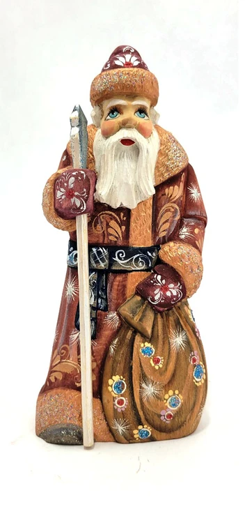 Grandfather Frost (Дед Мороз). A small, delicate Grandfather Frost with mischievous charm. Detailed painted carving from Sergiev Posad circa 2012.