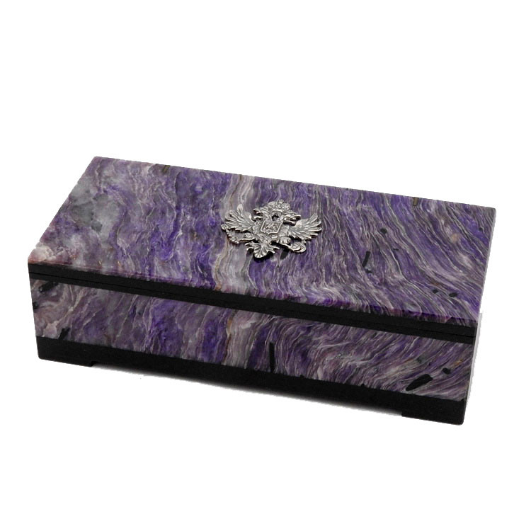 Charoite (сиреневый чароит). For your treasures and jewels! A lovely "lilac-violet stone" box, made from semi-precious charoite (сиреневый чароит), a mineral found only near the Chara River in the Yakutia/Irkutsk region of Russia.  It was discovered in 1949 and only 15 years later was it identified as a unique mineral in its own right. The gemstone is characterised by a silky luster and a delicate range of purple and violet colors from pale to dark. Sitting atop this elegant box is a cast sterling silver Double Headed Eagle of Imperial Russia, the Romanov family crest.