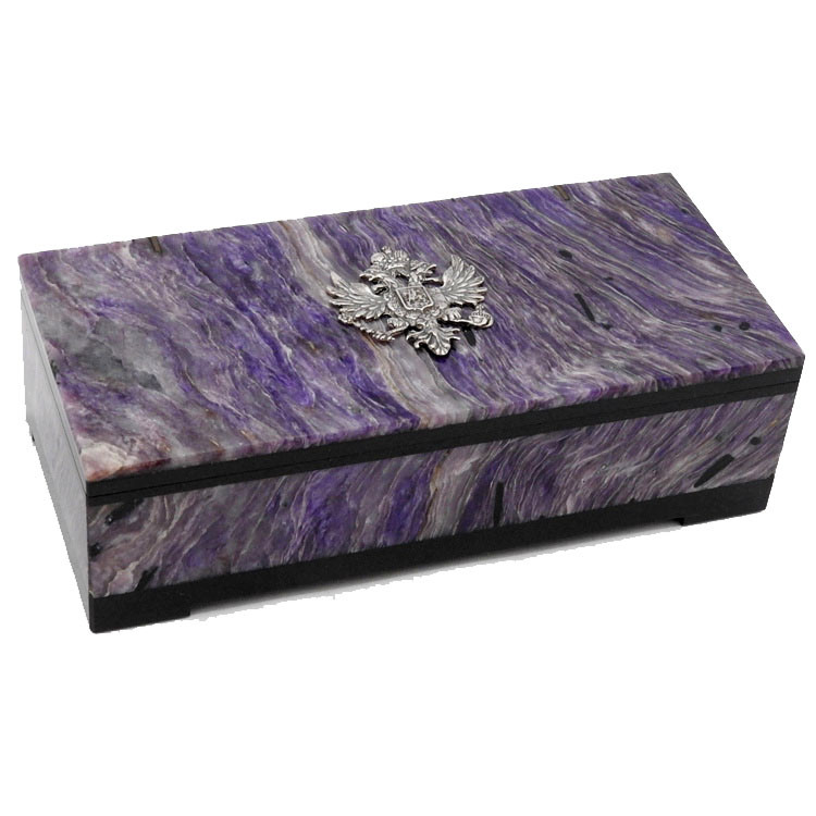 Charoite (сиреневый чароит). For your treasures and jewels! A lovely "lilac-violet stone" box, made from semi-precious charoite (сиреневый чароит), a mineral found only near the Chara River in the Yakutia/Irkutsk region of Russia.  It was discovered in 1949 and only 15 years later was it identified as a unique mineral in its own right. The gemstone is characterised by a silky luster and a delicate range of purple and violet colors from pale to dark. Sitting atop this elegant box is a cast sterling silver Double Headed Eagle of Imperial Russia, the Romanov family crest.