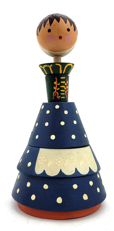 Vintage Stacker Toy. This vintage girl stacker toy resembles many cultures. It might be Salvo (Estonian) arts and crafts factory work, or perhaps it's Danish, or even Czech work. Even Poland can't be ruled out! This is the beauty of folk art! Since the stacker is unidentified, it can be one of the above, or even none of the above. In any case, it's very interesting. The red and yellow collar work that look like tulips might hold a clue in all this.  Approximately 9" in height and 4" base diameter.