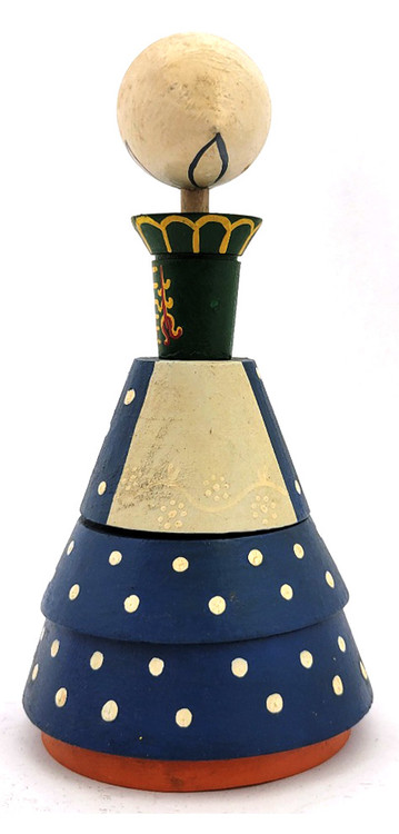 Vintage Stacker Toy. This vintage girl stacker toy resembles many cultures. It might be Salvo (Estonian) arts and crafts factory work, or perhaps it's Danish, or even Czech work. Even Poland can't be ruled out! This is the beauty of folk art! Since the stacker is unidentified, it can be one of the above, or even none of the above. In any case, it's very interesting. The red and yellow collar work that look like tulips might hold a clue in all this.  Approximately 9" in height and 4" base diameter.