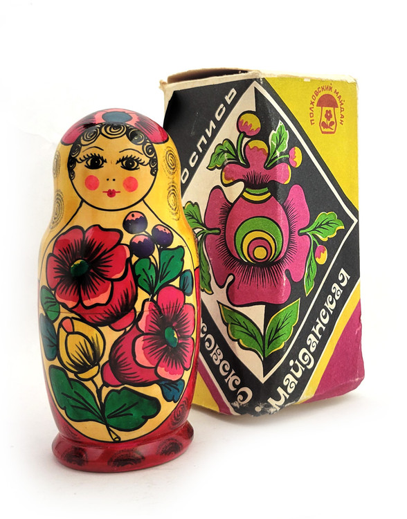 Polkhovsky-Maidan 4 nest. In the original factory packaging. Voznesensky region ("Вознесенское объединение "П-Майданская роспись"). Classic Polkhovsky-Maidan matryoshkas are decorated with India ink and aniline dyes. This nesting doll, with its appealing faces, was made at the production association "Polkhovsky-Maidan painting", which brought together the artists of Krutets, Polkhovsky-Maidan and Voznesenk. A paper label in Russian gives the date of manufacture (1988), ID number (НХП-ГО-2279а) and price (6.00) in rubles. Approx. 6" to 2¼".