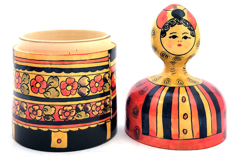 "Kadochka" Storage Jar from Polkhov Maidan. An intriguing functional small caddy, or wooden jar, which is painted with traditional Polkhov Maidan colors. The head of the storage jar is the grip and it opens from the center. These types of universal containers were intended for storing granulated sugar, salt, flour, dried mushrooms, tea, etc. 

Classic Polkhovsky-Maidan matryoshkas are decorated with India ink and aniline dyes. The worn label on the bottom of this appealing and intricately detailed caddy, indicates that it was made at the production association "Polkhovsky-Maidan painting" ("Вознесенское объединение "П-Майданская роспись"), which brought together the artists of Krutets, Polkhovsky-Maidan and Voznesenk.