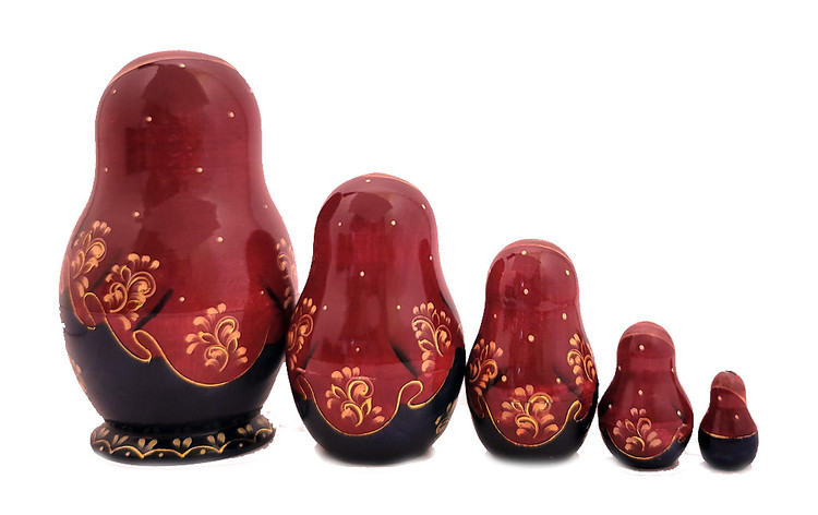 Winter Idyll (Зимняя идиллия). Winter scenes and churches are favorite topics of Russian nesting doll artists, and this one is not lacking in either.  The use of gold applique for enhancements date this one to mid-2010s. Also, there appears to be some faint writing on the bottom of the first doll, which seems to have been washed away. Usually, nesting dolls of this calibre are signed and dated. (Oh, well, it is what it is.) Overall an elegant and tastefully painted doll with expressive faces. 5 nest, 5" down to 1¼".