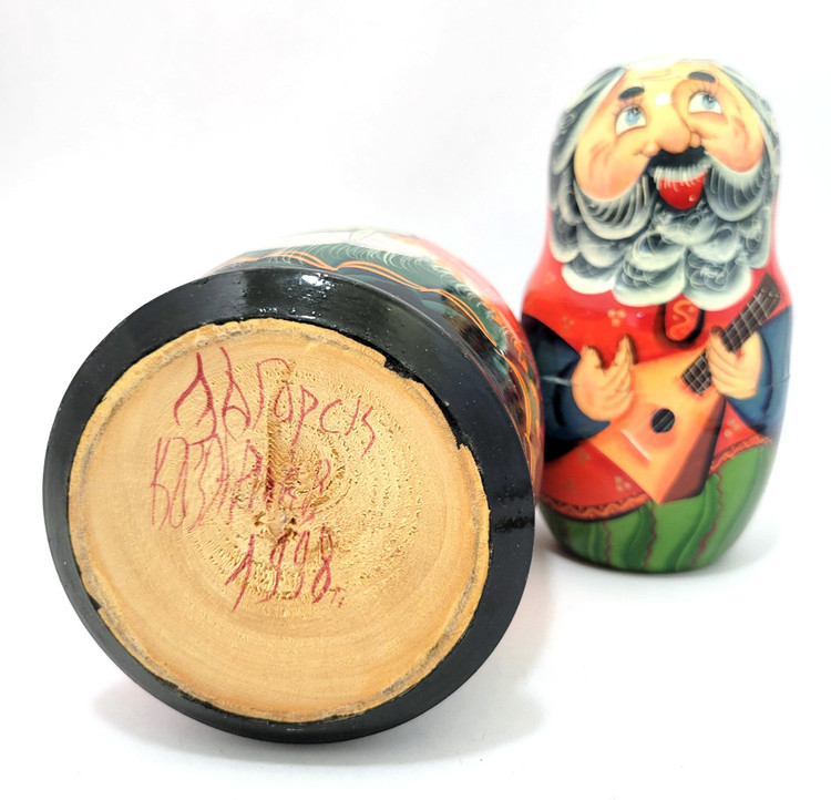 Extended Russian Farmhouse Family.  A finely painted artistic doll that features three generations of a simple family that lives on a farm in a village. Farm themes have always been popular in matryoshka production as the farm represents an idyllic and genuinely practical state of affairs in Russia, yesterday and today. The rural experience is universal, and while romanticized, it also reveals that which is mostly lost. This enjoyable set, that even manages to sneak a birch limb on the first doll, is from Zagorsk. 10 nest, 8"x 1".