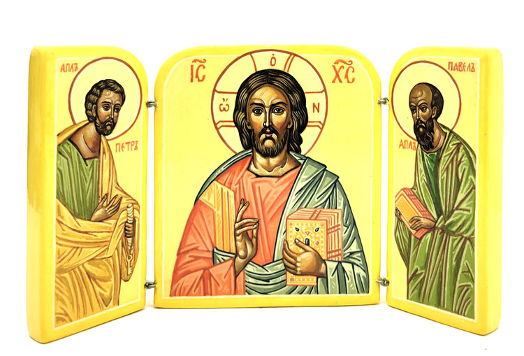 Christ with Saints (Христос со святыми) Icon. Peter is first among the Apostles due to his authority, while Paul is also equal among the first due to his labor. As pillars of the Church, they are commonly depicted together. On this entirely hand made triptych, they are to either side of Christ the Teacher who holds a gospel and bestows a blessing. Christ wears a blue himation and a softly colored tunic. Two Russian Orthodox crosses adorn the cover when folded.