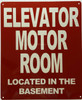 ELEVATOR MOTOR ROOM LOCATED IN THE BASEMENT Signage