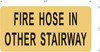 Fire hose in other stairway sign - The Gold Mountain Line