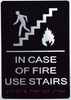 In case of fire use stairs sign with braille and raised letter ada black