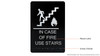 In case of fire use stairs ada black sign