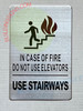 IN CASE OF FIRE DO NOT USE ELEVATOR USE STAIRWAY Signage