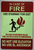 IN CASE OF FIRE USE STAIRS FOR EXIT DO NOT USE THIS ELEVATOR Signage