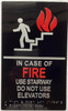 IN CASE OF FIRE USE STAIRWAY DO NOT USE ELEVATOR Signage Raised letters & Grade 2 Braille - Includes Red Adhesive pad for Easy Installation - The Sensation line