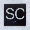 Floor SC (Sub Cellar) - Elevator floor number Jamb Plate sign with braille and raised letter size 4x4 inch -The sensation line ( Black/silver )