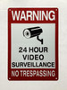 Warning 24 hour video surveillance no trespassing