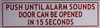 Push until alarm sounds door can be open in 15 seconds sign