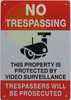 No trespassing this property protected by video surveillance  Compliance Sign