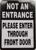 NOT AN ENTRANCE PLEASE ENTER THROUGH FRONT DOOR STICKER SIGN