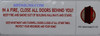 IN A FIRE, CLOSE ALL DOORS BEHIND YOU STICKER  Building Sign