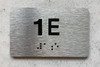 APT# 1E SILVER Ada Sign