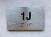 APT# 1J SILVER Safety Sign