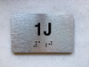 APT# 1J SILVER Compliance Sign