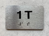 APT# 1T SILVER Braille Sign