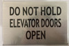 Do not hold elevator dooes open ( 6x4 inch silver)