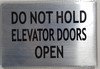 Do not hold elevator dooes open ( 6x4 inch silver)