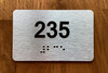 Apartment number 235 Ada Sign