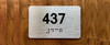 Apartment number 437 Ada Sign