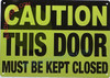 CAUTION: THIS DOOR MUST BE KEPT CLOSED
