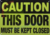 CAUTION: THIS DOOR MUST BE KEPT CLOSED SIGNAGE