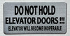 DO NOT HOLD ELEVATOR DOORS !!! ELEVATOR WILL BECOME INOPERABLE SIGN