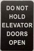DO NOT HOLD ELEVATOR DOORS OPEN