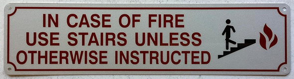 IN CASE OF FIRE USE STAIRS