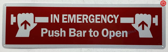 IN EMERGENCY PUSH BAR TO OPEN