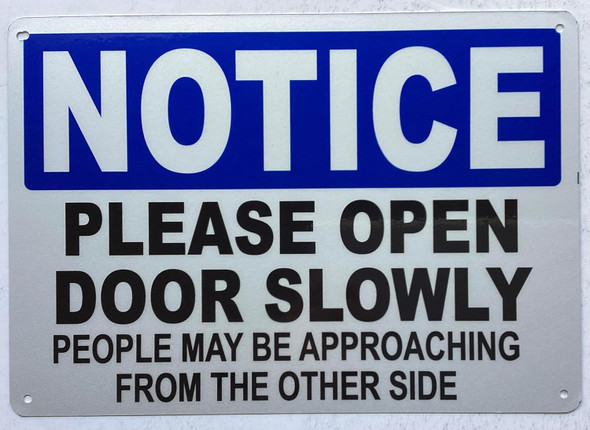 Notice Please open door slowly SIGN