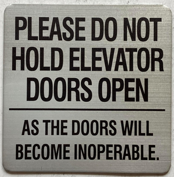 please do not hold elevator doors open as the doors will become inoperable sign